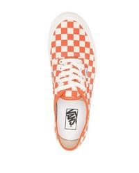 Baskets basses à carreaux orange Vans