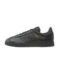 Baskets basses dorées adidas