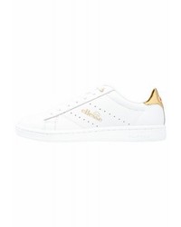 Baskets basses dorées Ellesse