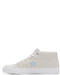 Baskets basses en cuir beiges Converse