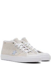 Baskets basses en cuir beiges Converse