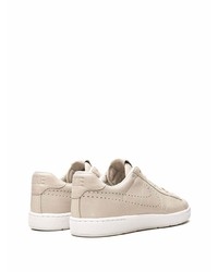 Baskets basses en cuir beiges Nike