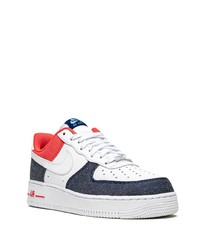 Baskets basses en cuir blanc et bleu marine Nike