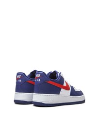 Baskets basses en cuir blanc et bleu marine Nike