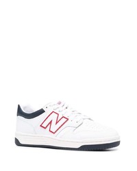 Baskets basses en cuir blanc et bleu marine New Balance