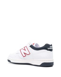 Baskets basses en cuir blanc et bleu marine New Balance