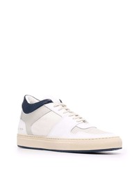 Baskets basses en cuir blanc et bleu marine Common Projects