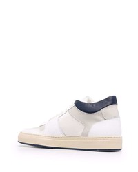 Baskets basses en cuir blanc et bleu marine Common Projects