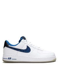Baskets basses en cuir blanc et bleu marine Nike