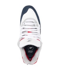 Baskets basses en cuir blanc et bleu marine New Balance