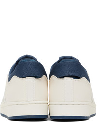 Baskets basses en cuir blanc et bleu marine adidas Originals