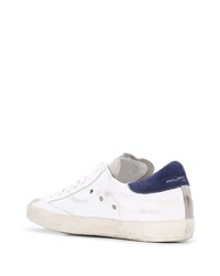 Baskets basses en cuir blanc et bleu marine Philippe Model Paris