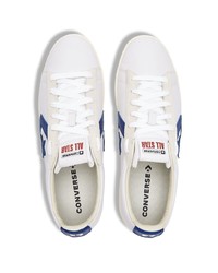 Baskets basses en cuir blanc et bleu marine Converse