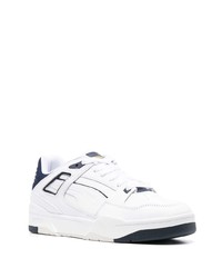 Baskets basses en cuir blanc et bleu marine Puma