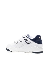 Baskets basses en cuir blanc et bleu marine Puma