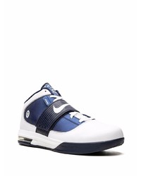 Baskets basses en cuir blanc et bleu marine Nike