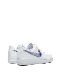 Baskets basses en cuir blanc et bleu Nike