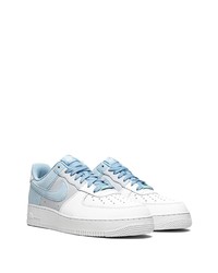 Baskets basses en cuir blanc et bleu Nike