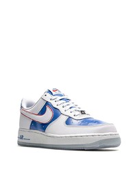 Baskets basses en cuir blanc et bleu Nike