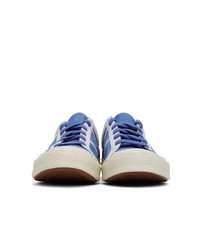 Baskets basses en cuir blanc et bleu Converse