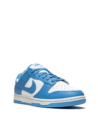 Baskets basses en cuir blanc et bleu Nike