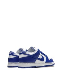 Baskets basses en cuir blanc et bleu Nike