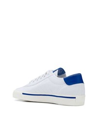 Baskets basses en cuir blanc et bleu adidas