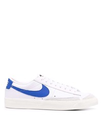 Baskets basses en cuir blanc et bleu Nike