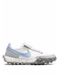 Baskets basses en cuir blanc et bleu Nike