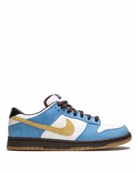 Baskets basses en cuir blanc et bleu Nike