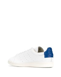 Baskets basses en cuir blanc et bleu adidas