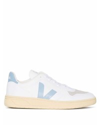 Baskets basses en cuir blanc et bleu Veja