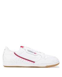 Baskets basses en cuir blanc et rouge adidas