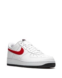 Baskets basses en cuir blanc et rouge Nike