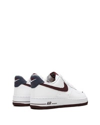 Baskets basses en cuir blanc et rouge Nike