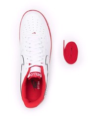 Baskets basses en cuir blanc et rouge Nike