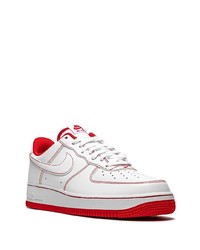 Baskets basses en cuir blanc et rouge Nike