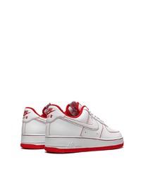 Baskets basses en cuir blanc et rouge Nike