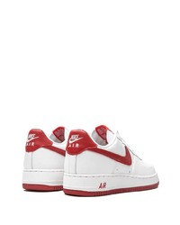 Baskets basses en cuir blanc et rouge Nike