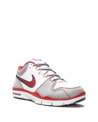 Baskets basses en cuir blanc et rouge Nike