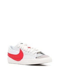 Baskets basses en cuir blanc et rouge Nike