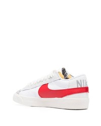 Baskets basses en cuir blanc et rouge Nike