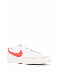 Baskets basses en cuir blanc et rouge Nike