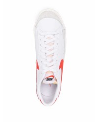 Baskets basses en cuir blanc et rouge Nike