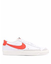 Baskets basses en cuir blanc et rouge Nike