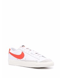 Baskets basses en cuir blanc et rouge Nike