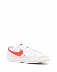 Baskets basses en cuir blanc et rouge Nike