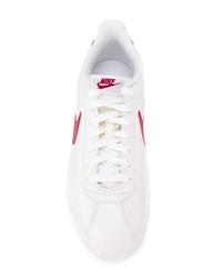 Baskets basses en cuir blanc et rouge Nike