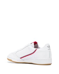 Baskets basses en cuir blanc et rouge adidas