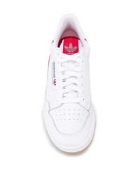 Baskets basses en cuir blanc et rouge adidas